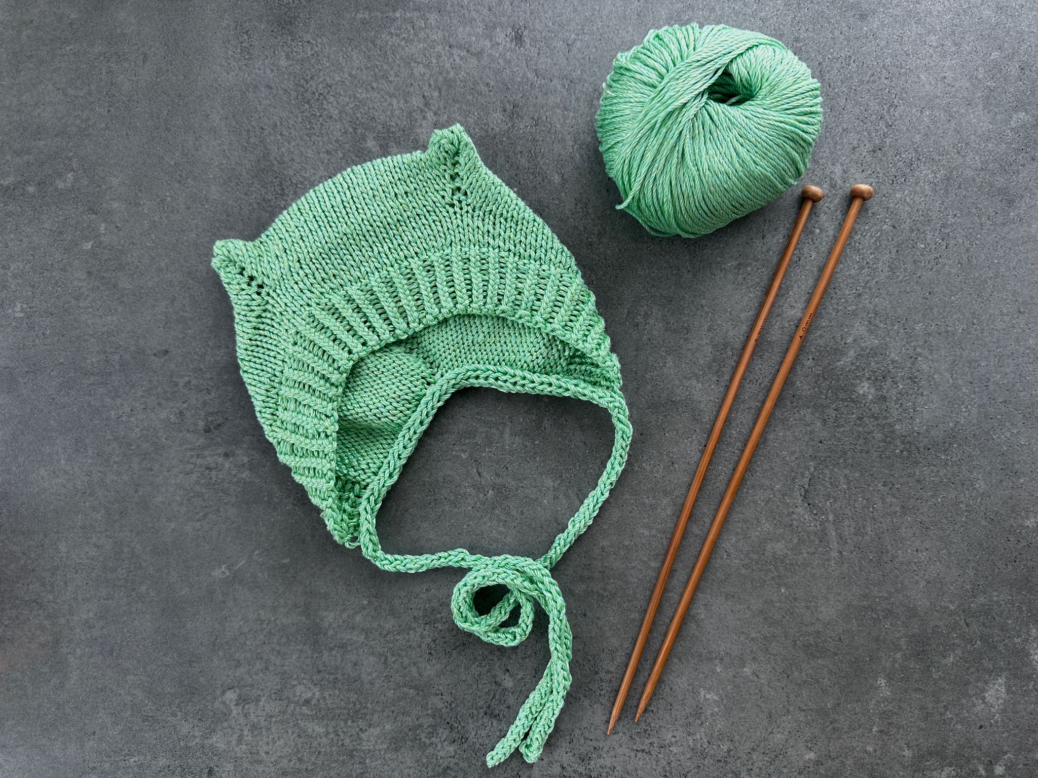 Ozoknit Baby bonnet hat with earflaps knitting pattern for newborns and babies Ozoknit Baby bonnet hat with earflaps knitting pattern for newborns and babies